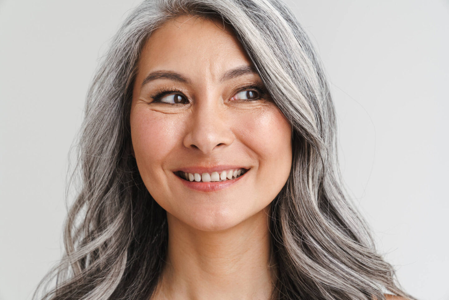 Can Certain Hair Products or Environmental Factors Contribute to Yellowing of Gray Hair, and If So, how Can One Prevent It?